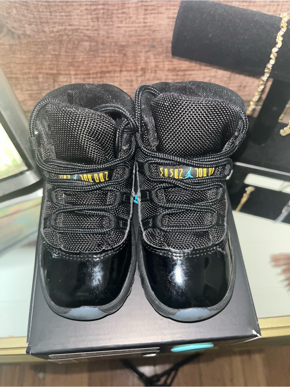 Jordan Kids Black High-Top Sneakers with Teal & Yellow Accents